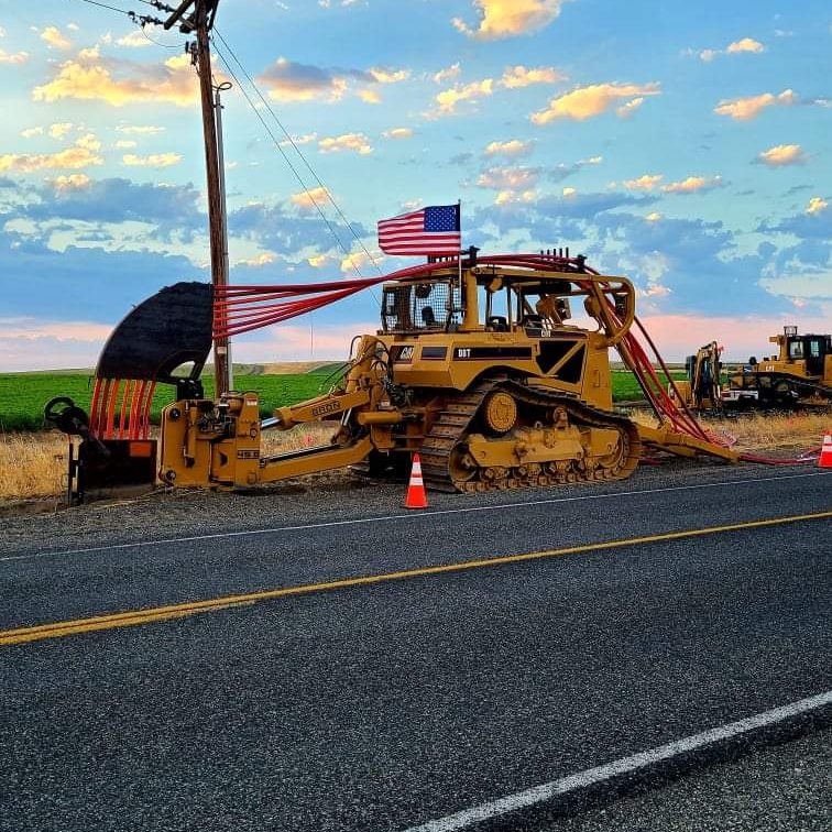 Windwave cable plow crew at sunrise